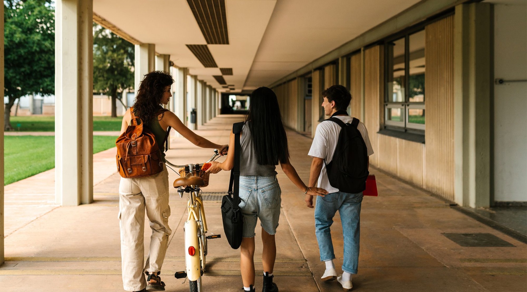 Find your perfect fit at Lancaster Apartments a group of friends with their bags and a bike