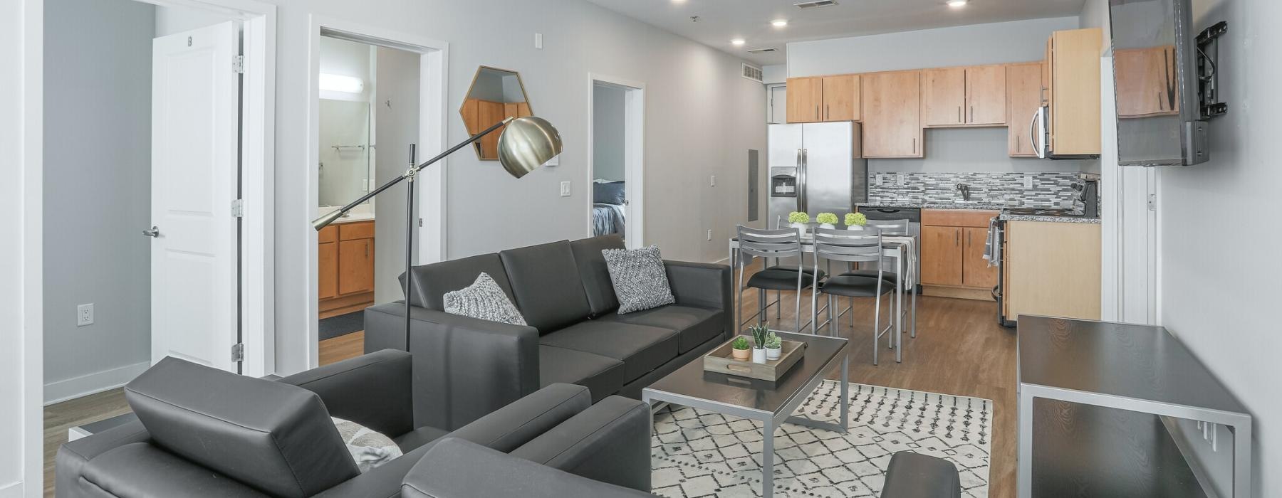 a living room with a couch and a table